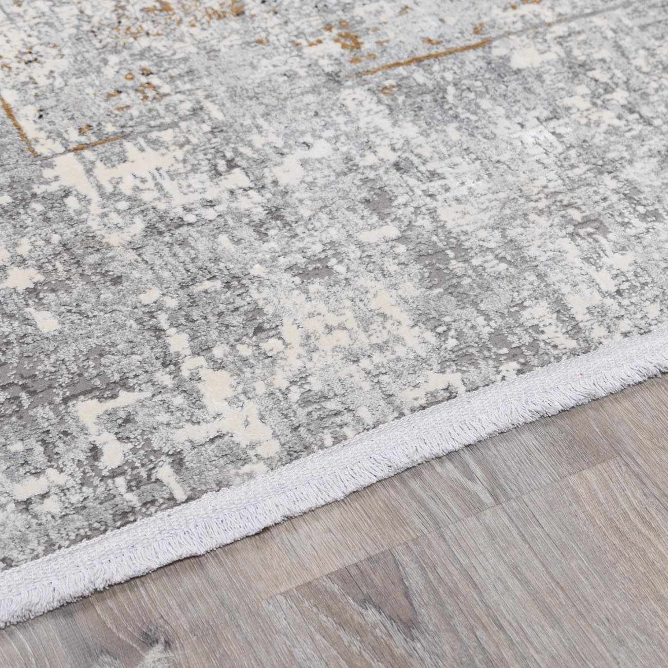 Calion Distressed Charcoal Luxury Fringed Faux Silk Rug