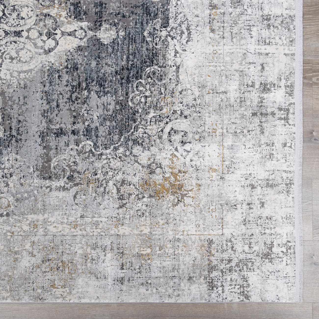 Calion Distressed Charcoal Luxury Fringed Faux Silk Rug