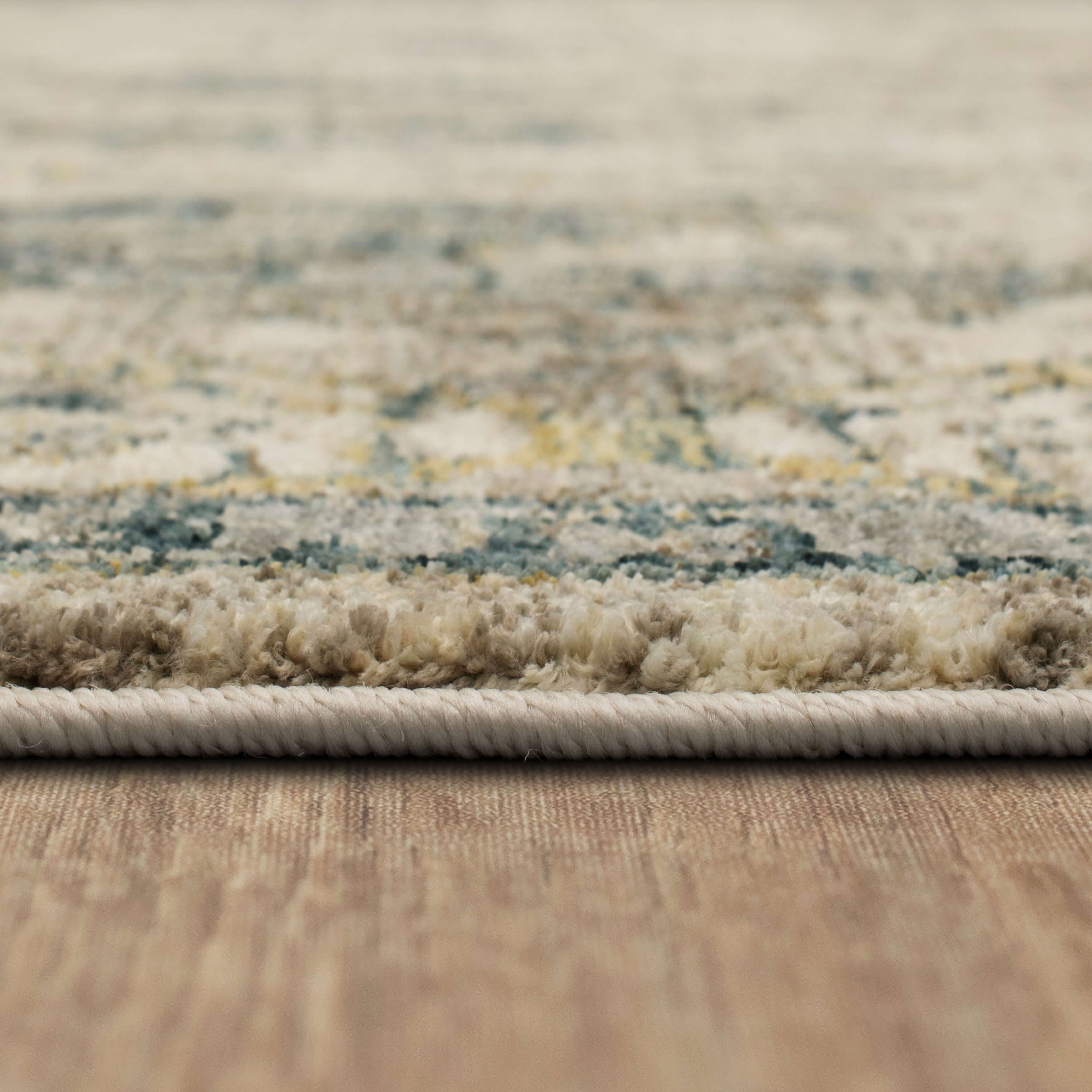 Darica Cream Area Rug