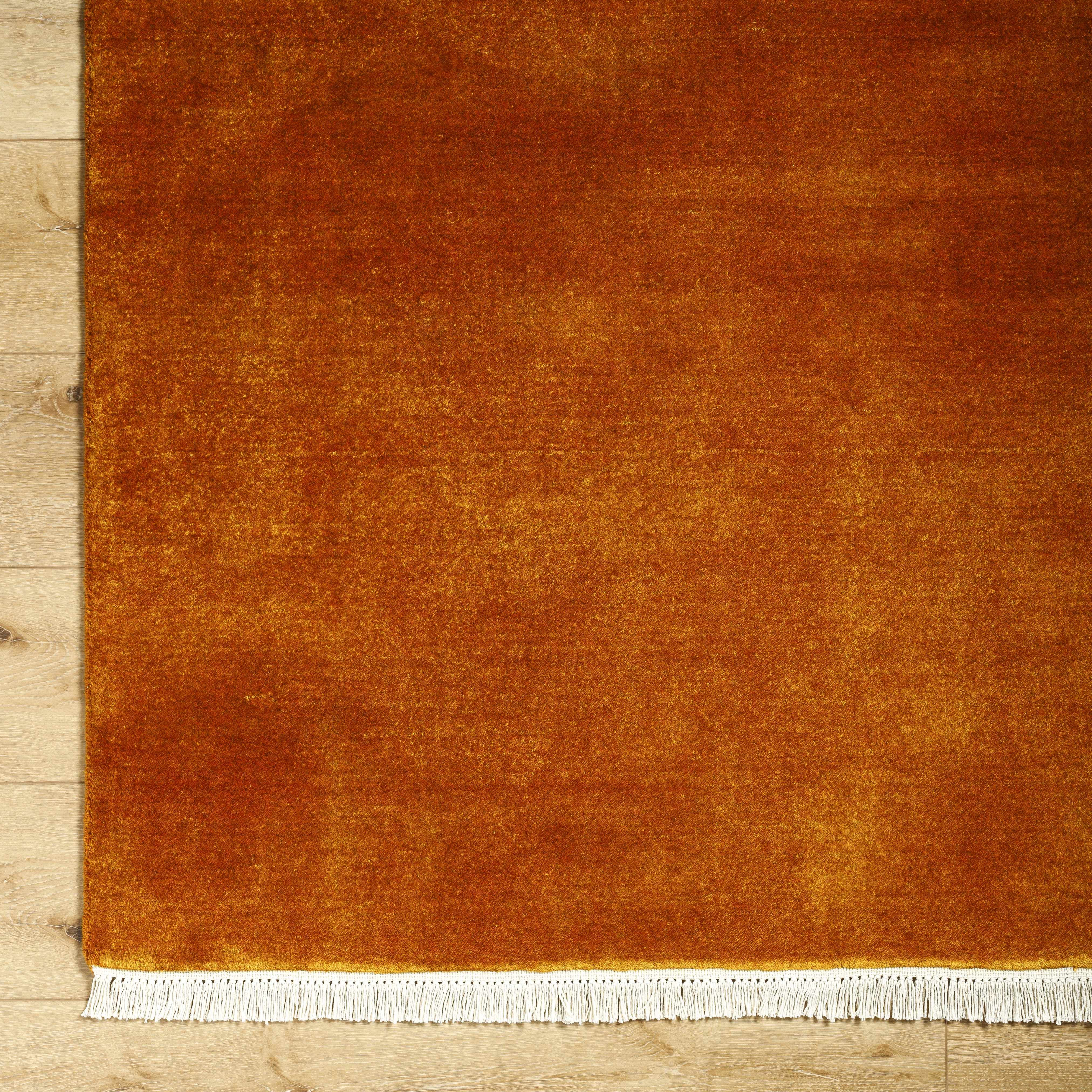 Charming Hand Loomed Solid Rust Wool Area Rug