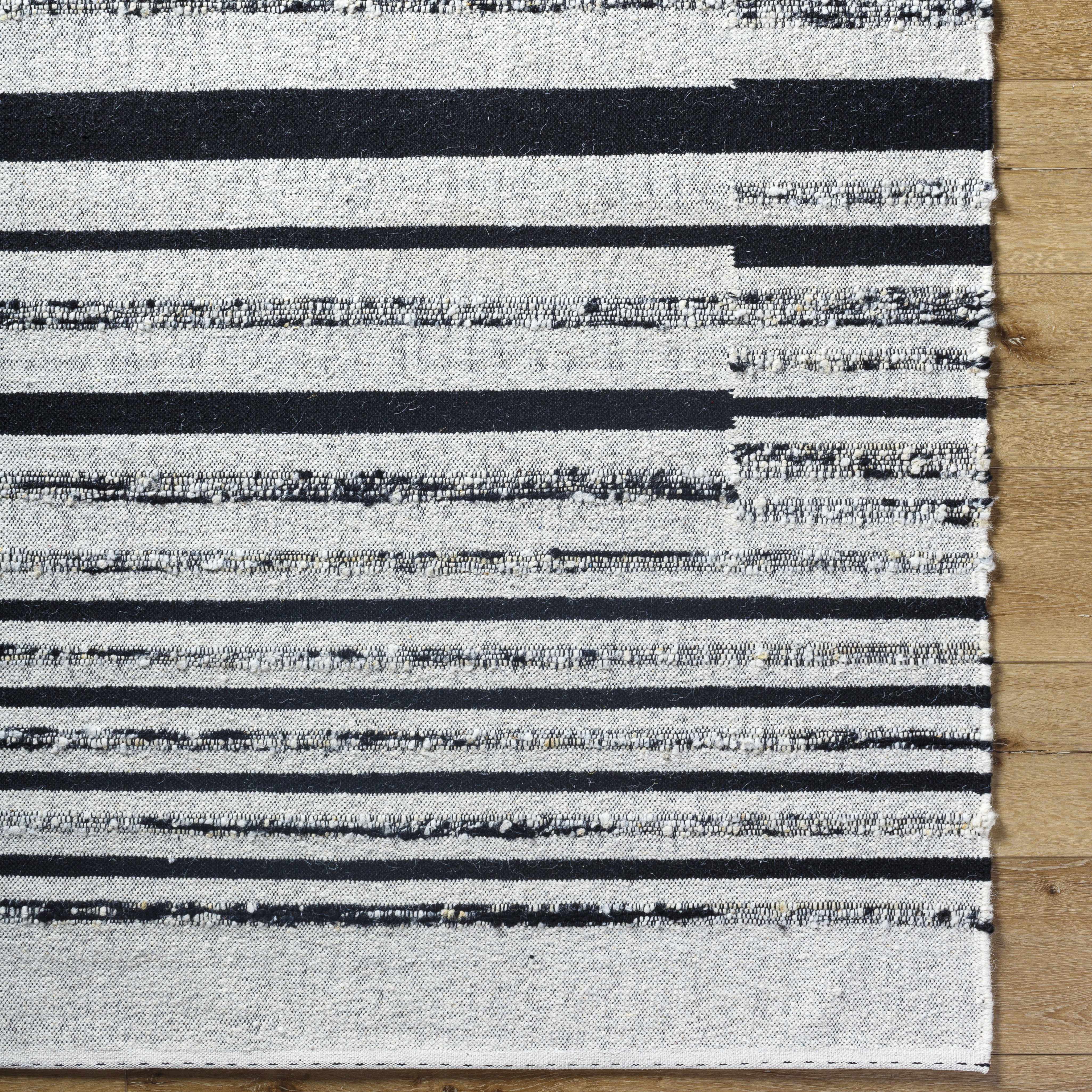 Artfully Subtle Black Hand Woven Wool & Cotton Area Rug