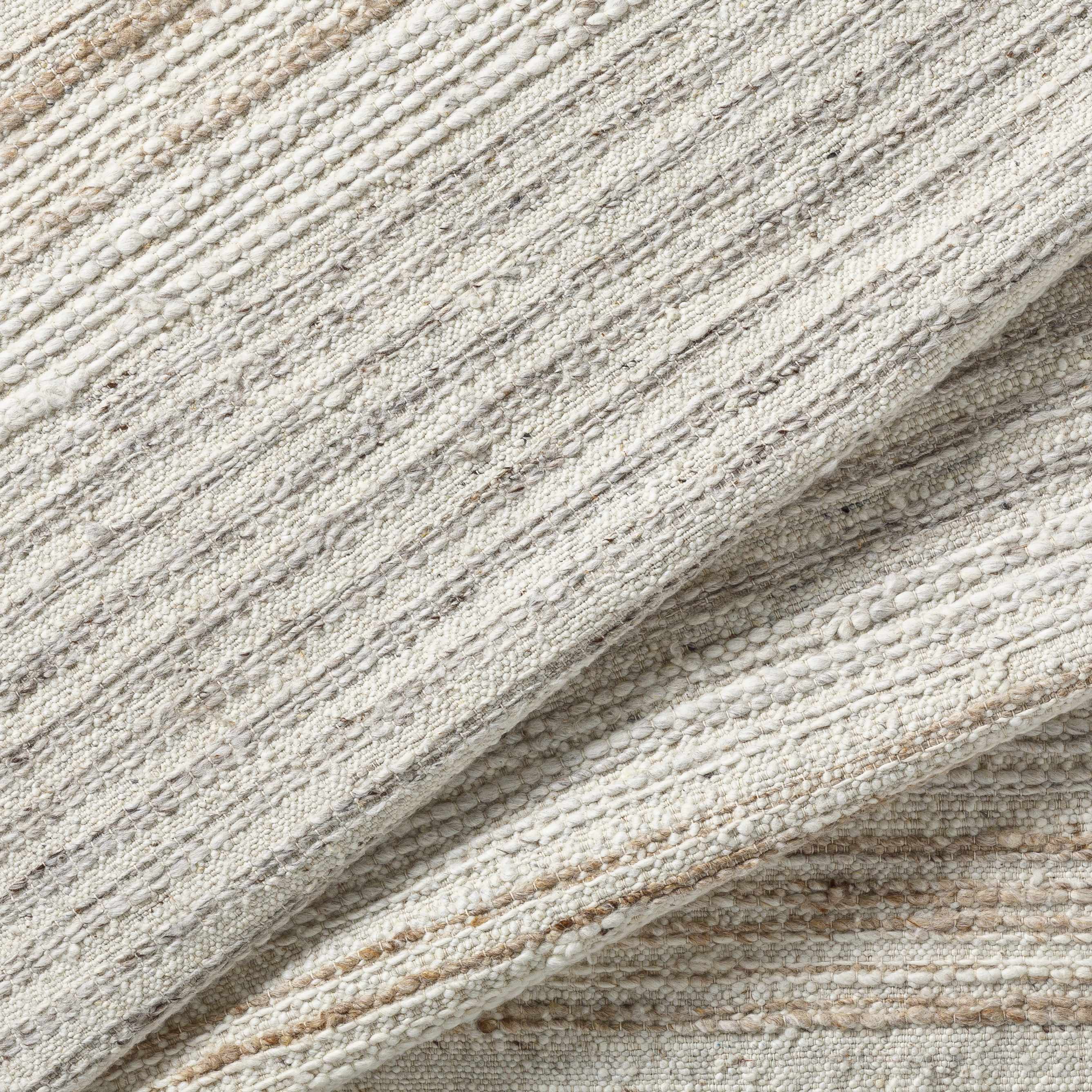Nifty Cream Hand Woven Wool Area Rug