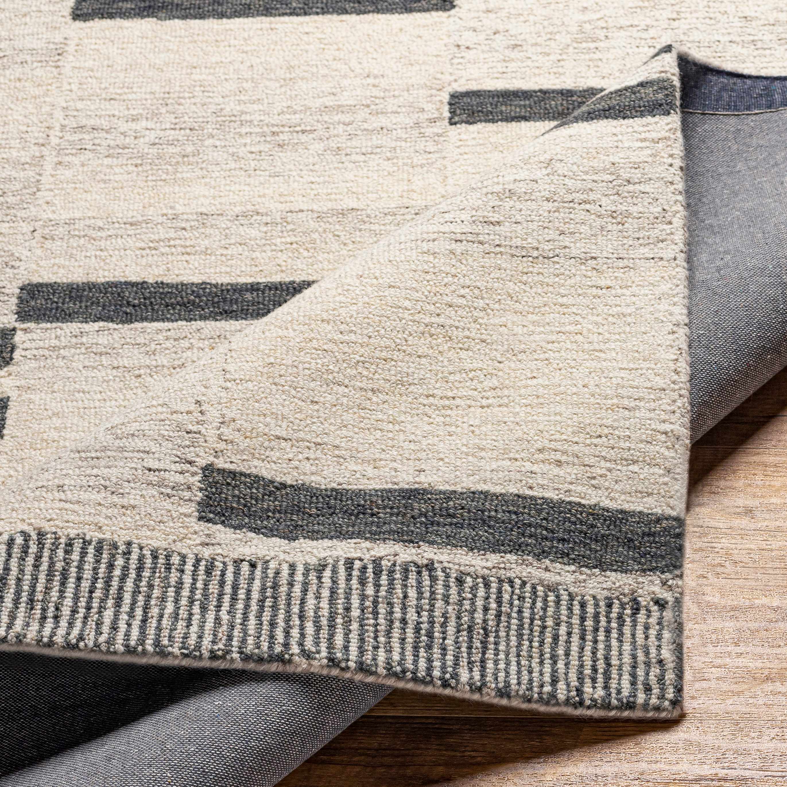 Irregular Beige Hand Tufted Wool Area Rug