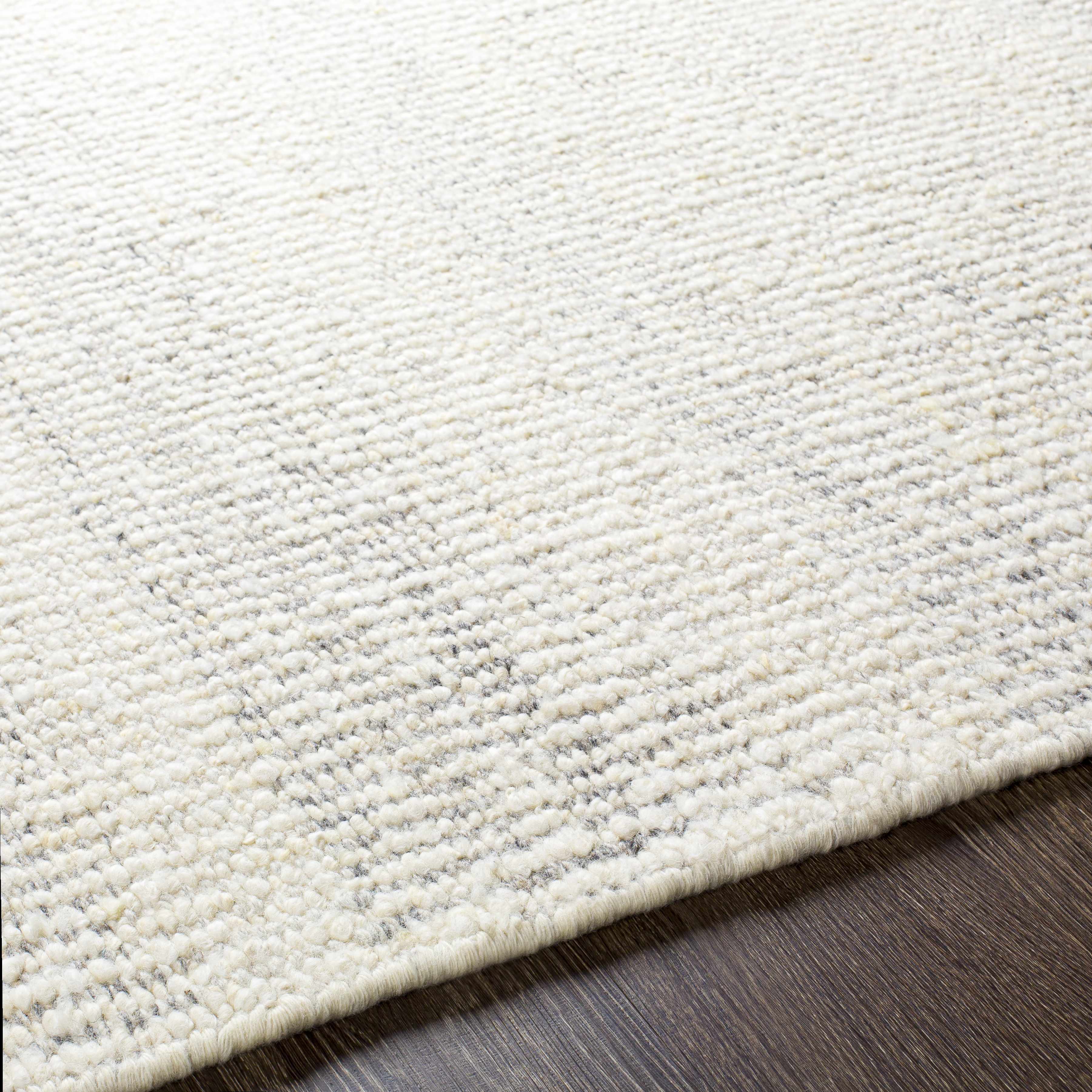 Exotic Chic Cream Hand Woven Wool Area Rug