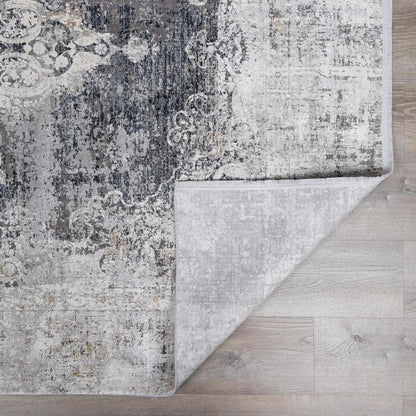 Calion Distressed Charcoal Luxury Fringed Faux Silk Rug