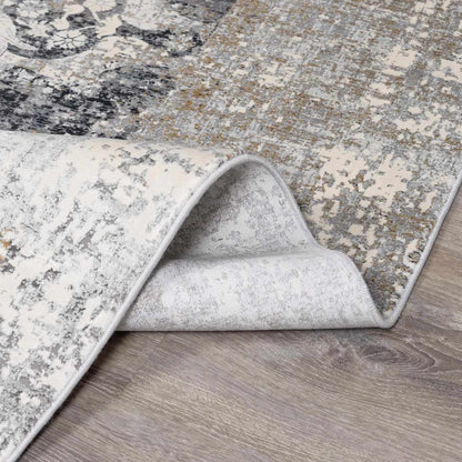 Calion Distressed Charcoal Luxury Fringed Faux Silk Rug
