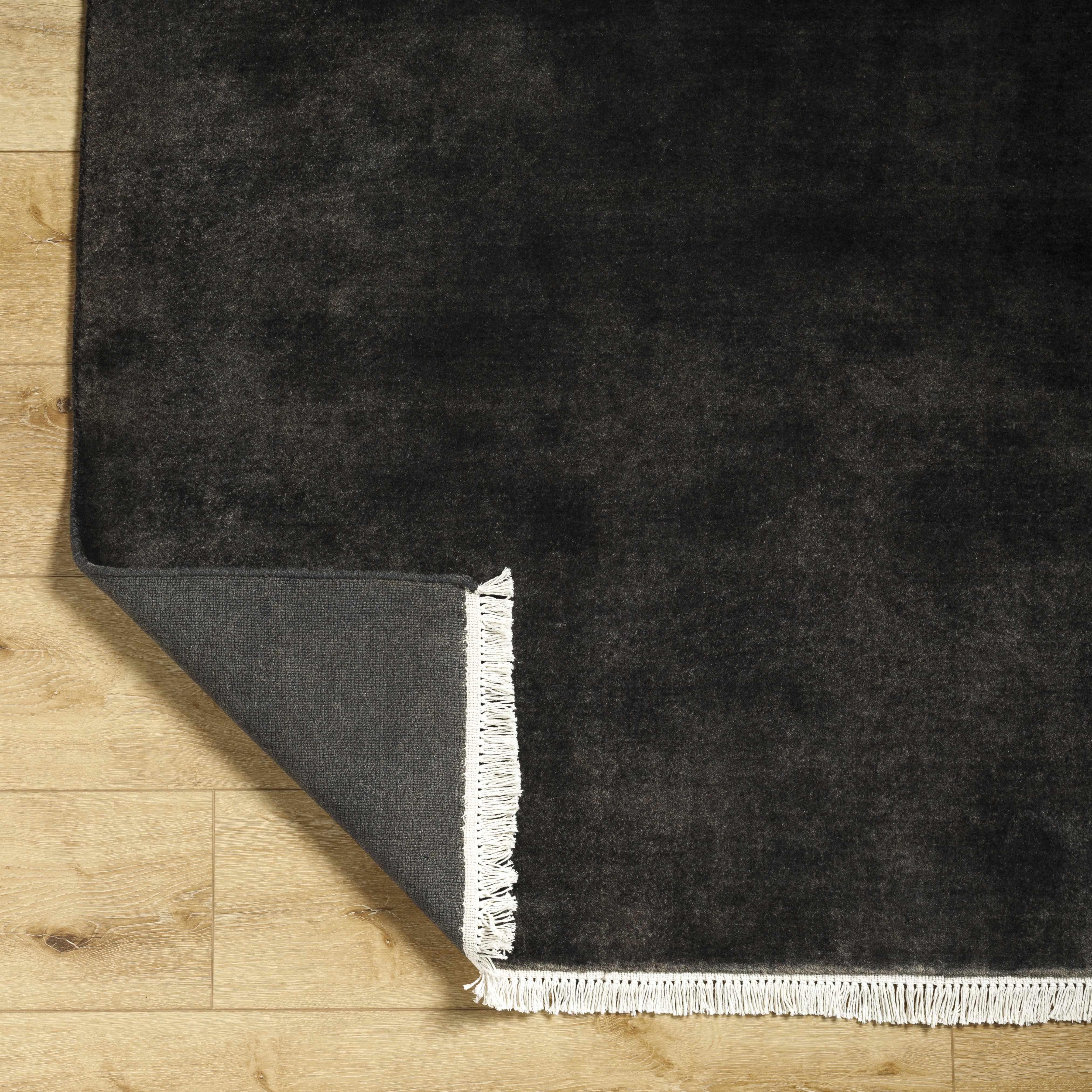 Timeless Solid Black Hand-Loomed Wool Area Rug