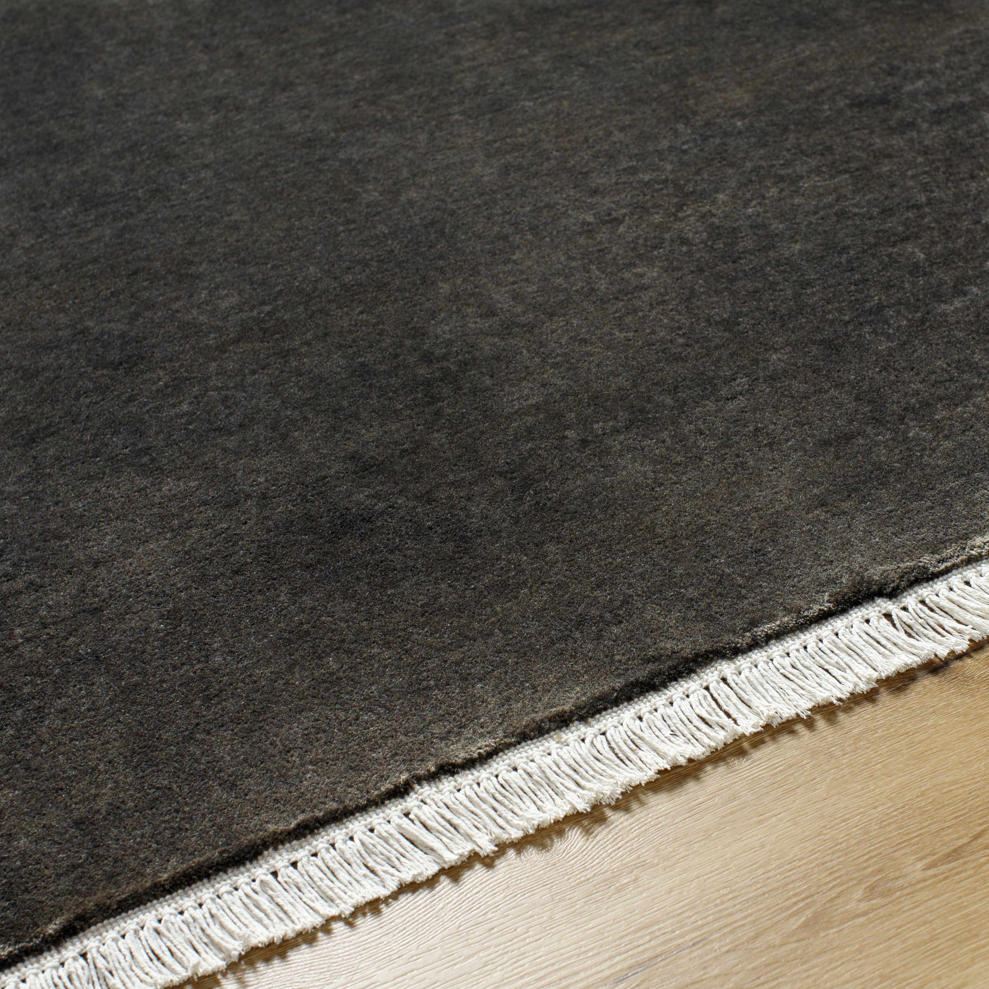 Timeless Solid Black Hand-Loomed Wool Area Rug