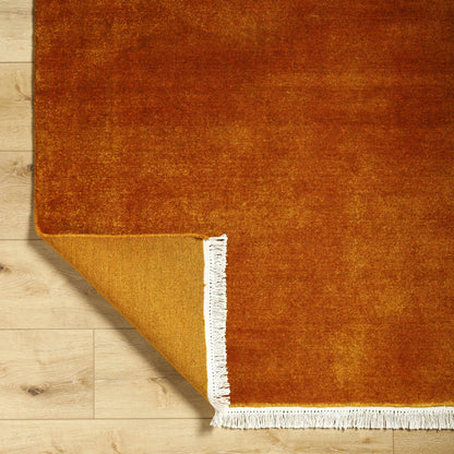 Charming Hand Loomed Solid Rust Wool Area Rug