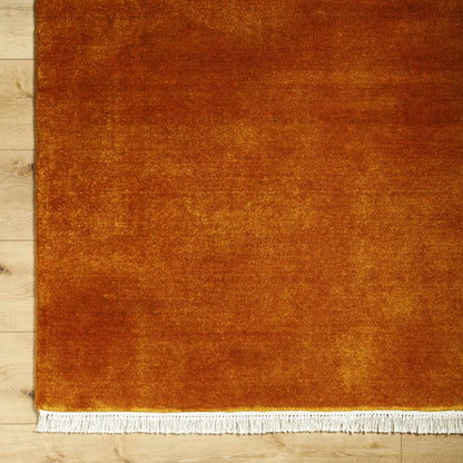 Charming Hand Loomed Solid Rust Wool Area Rug