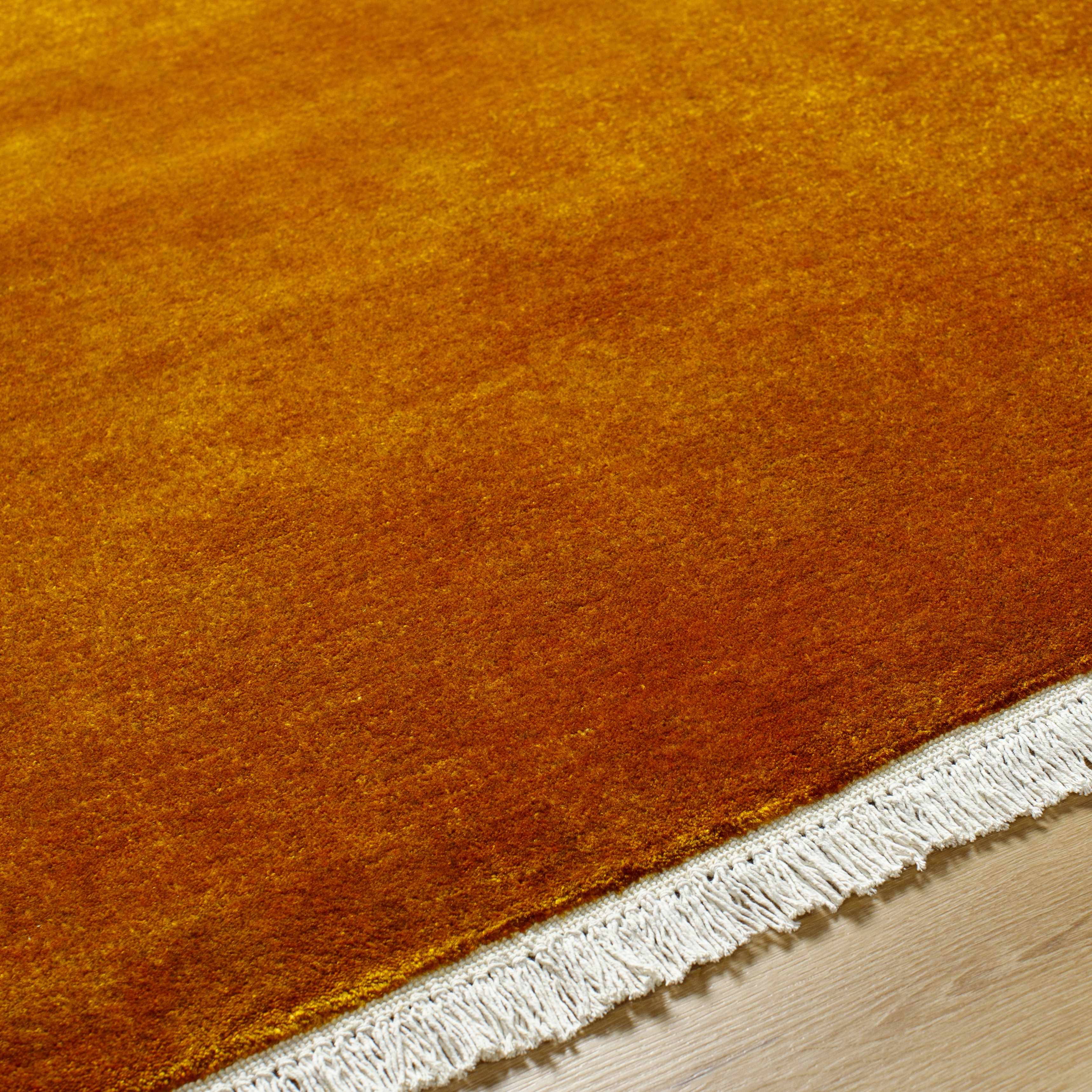 Charming Hand Loomed Solid Rust Wool Area Rug