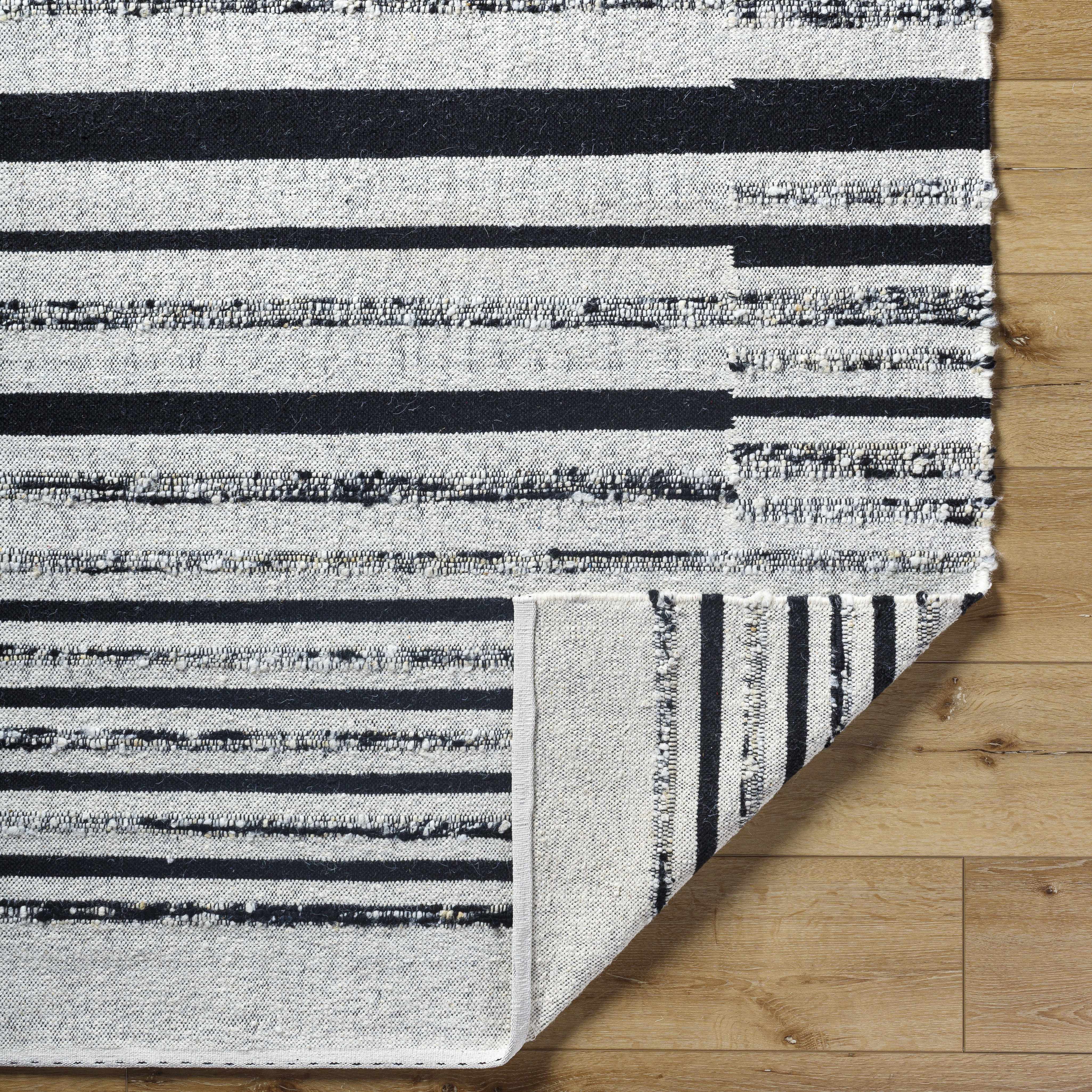 Artfully Subtle Black Hand Woven Wool & Cotton Area Rug