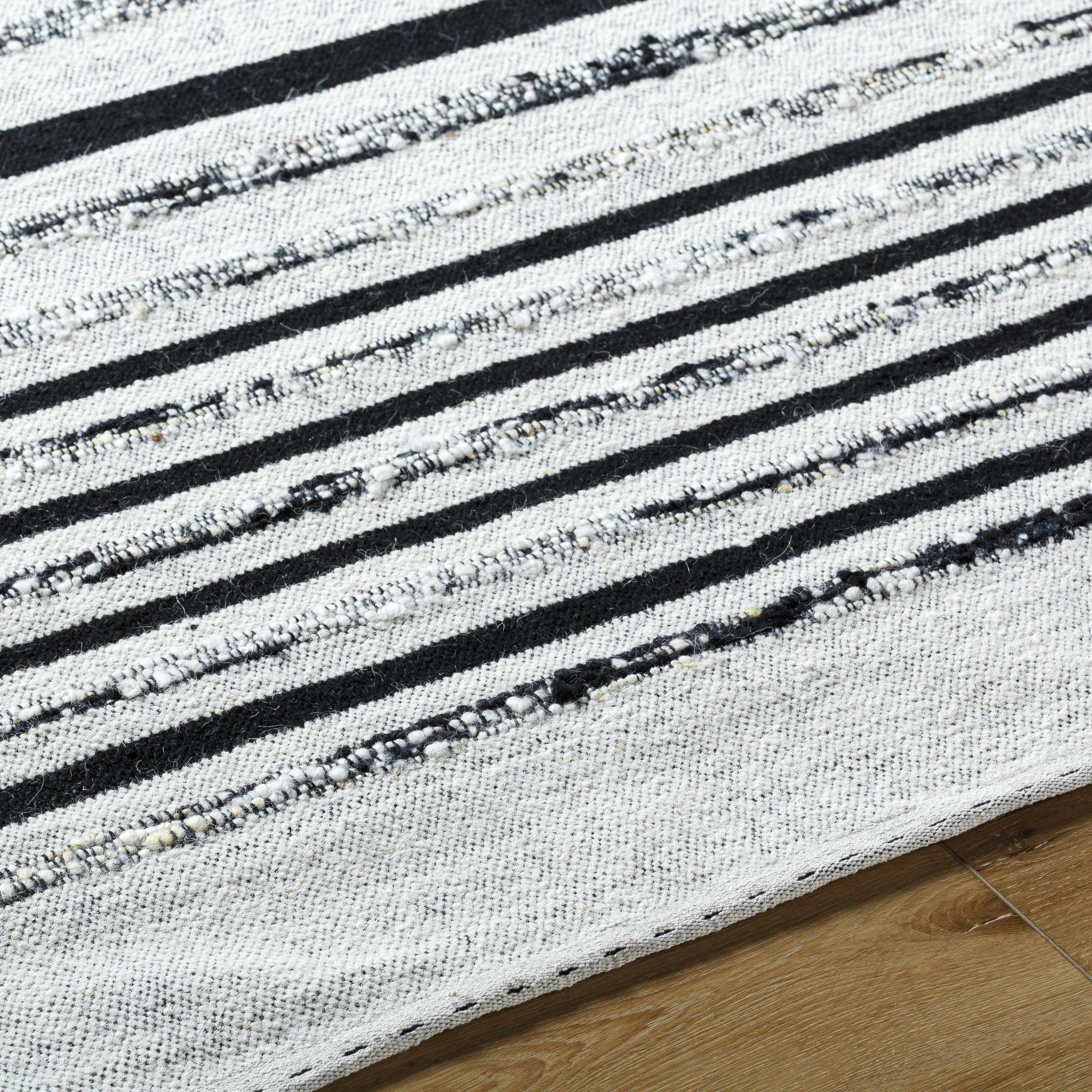 Artfully Subtle Black Hand Woven Wool & Cotton Area Rug