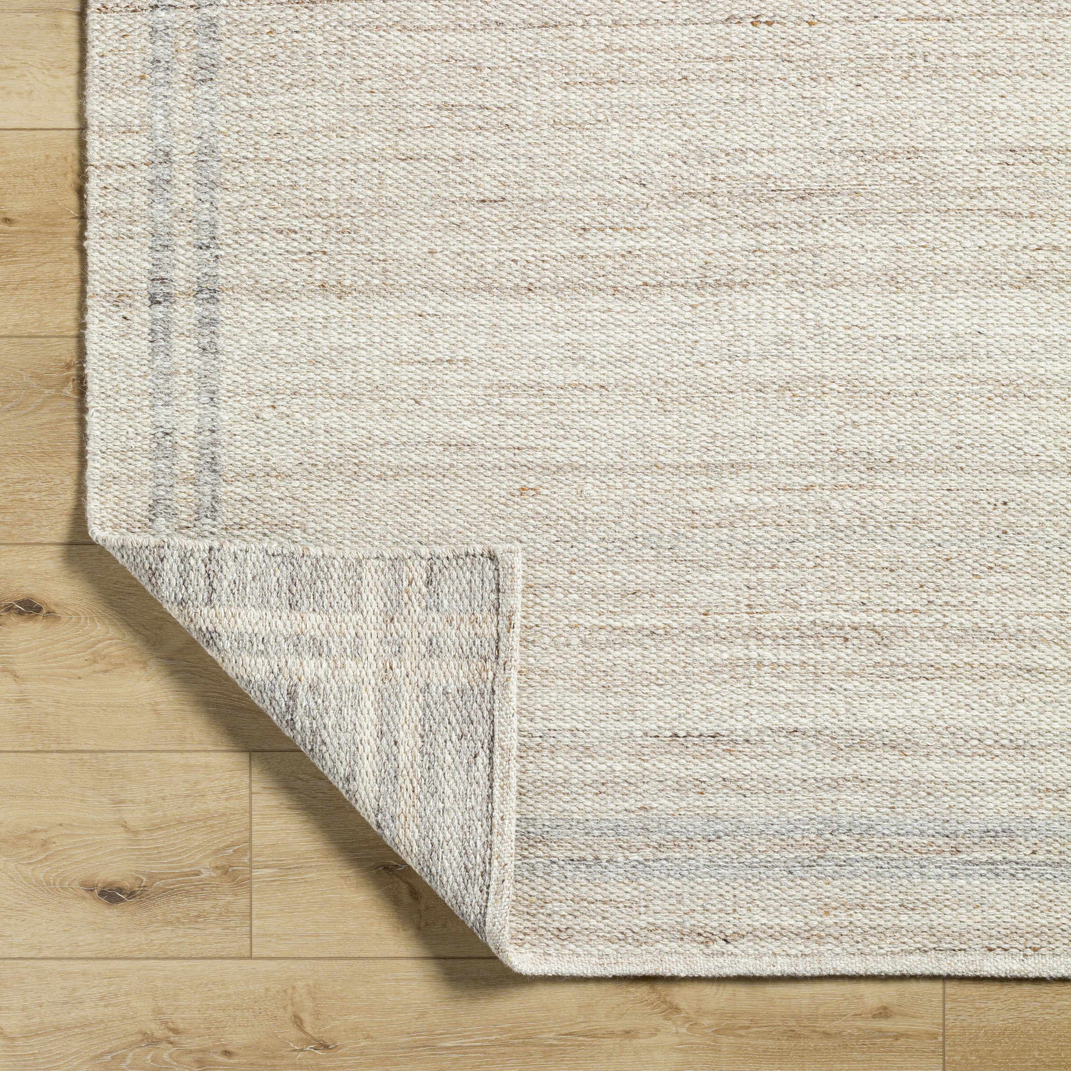 Chic Enchanting Ivory Wool Handwoven Area Rug