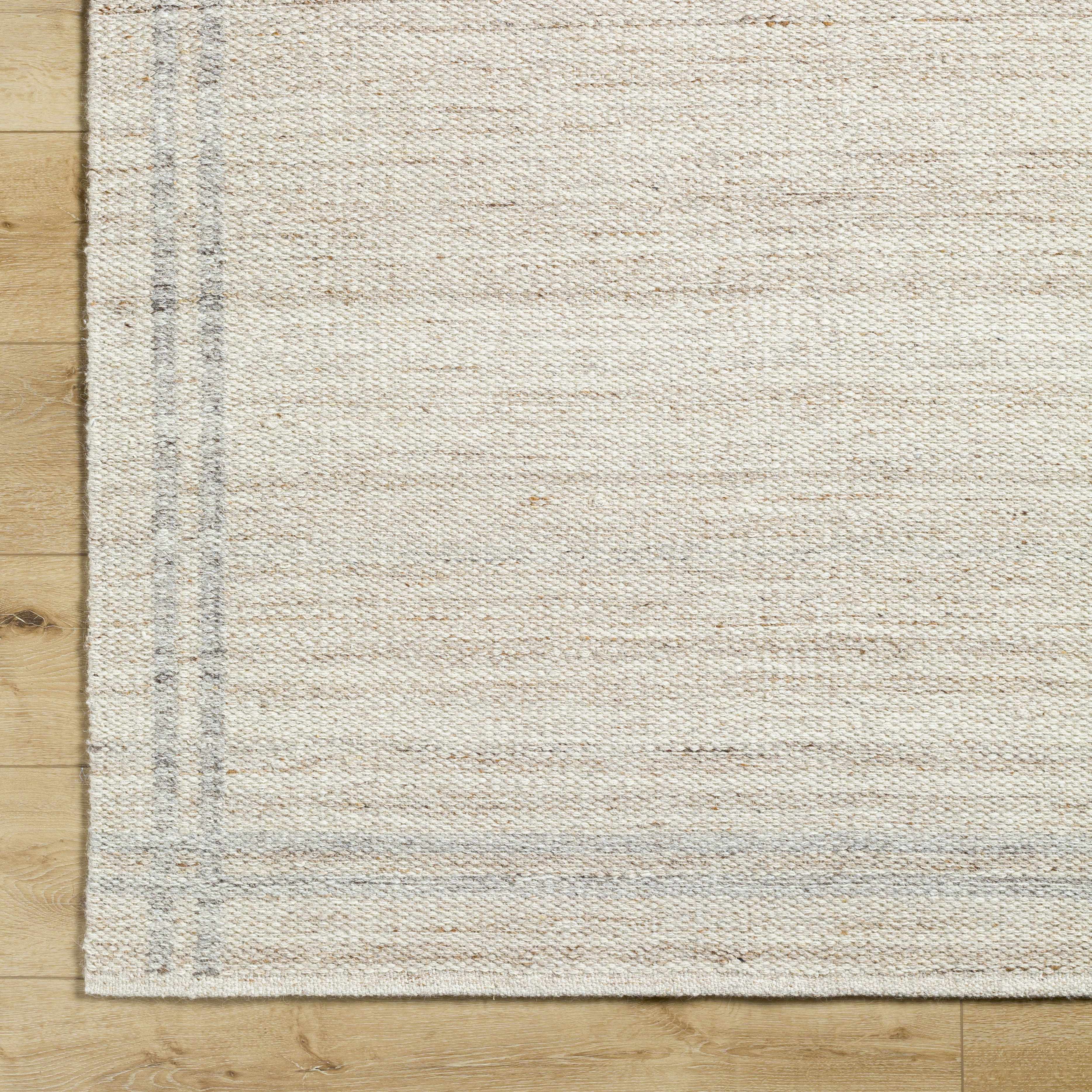 Chic Enchanting Ivory Wool Handwoven Area Rug