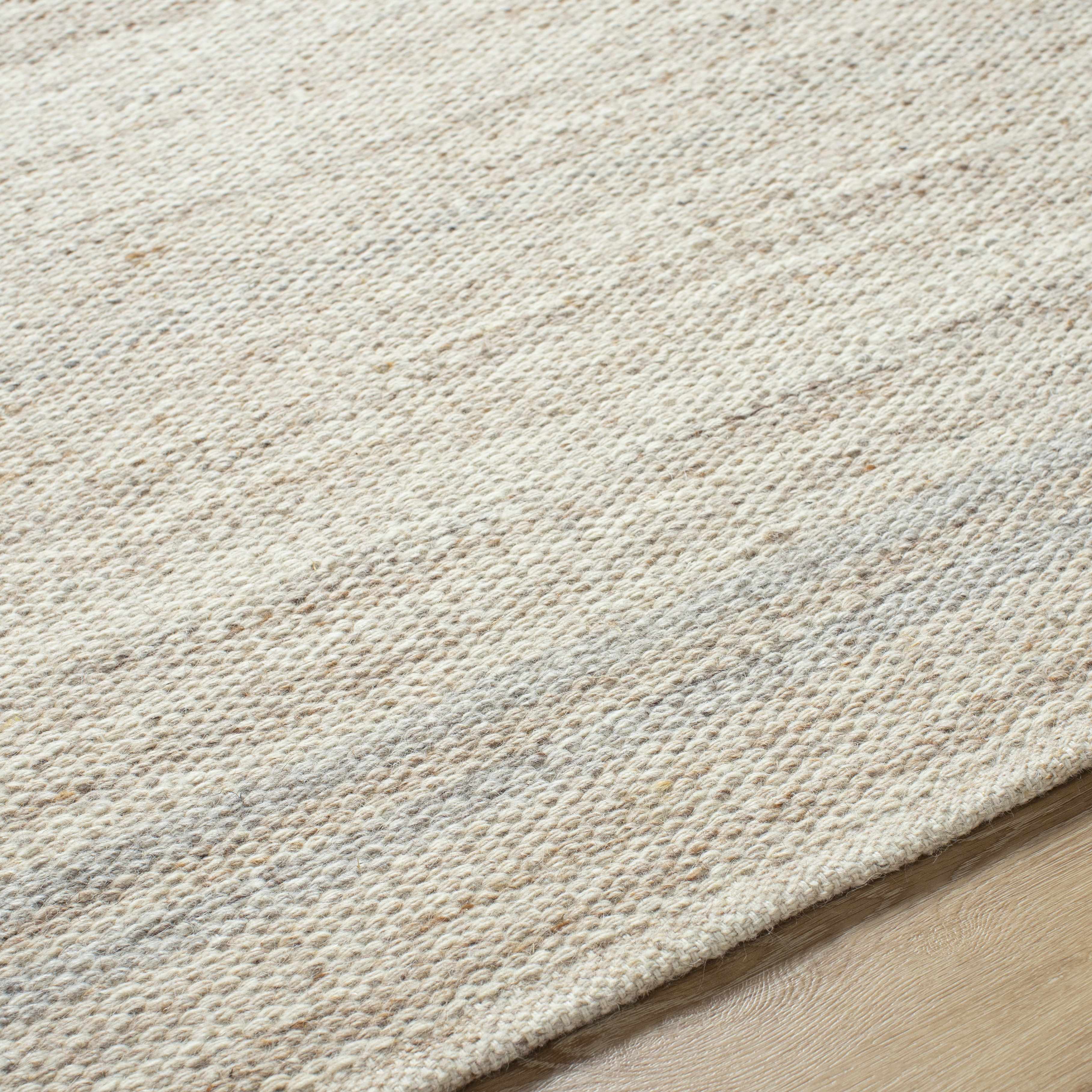 Chic Enchanting Ivory Wool Handwoven Area Rug