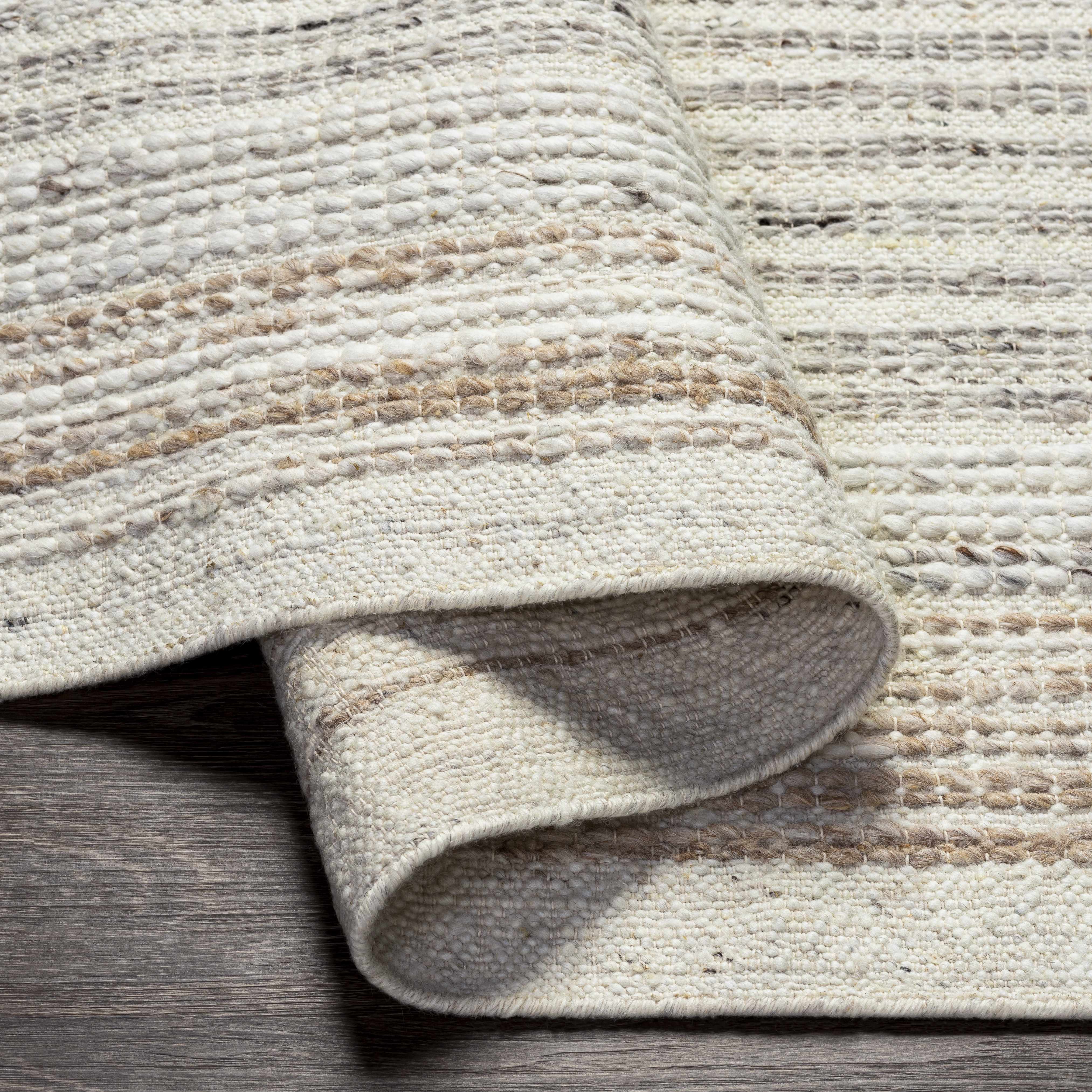 Nifty Cream Hand Woven Wool Area Rug