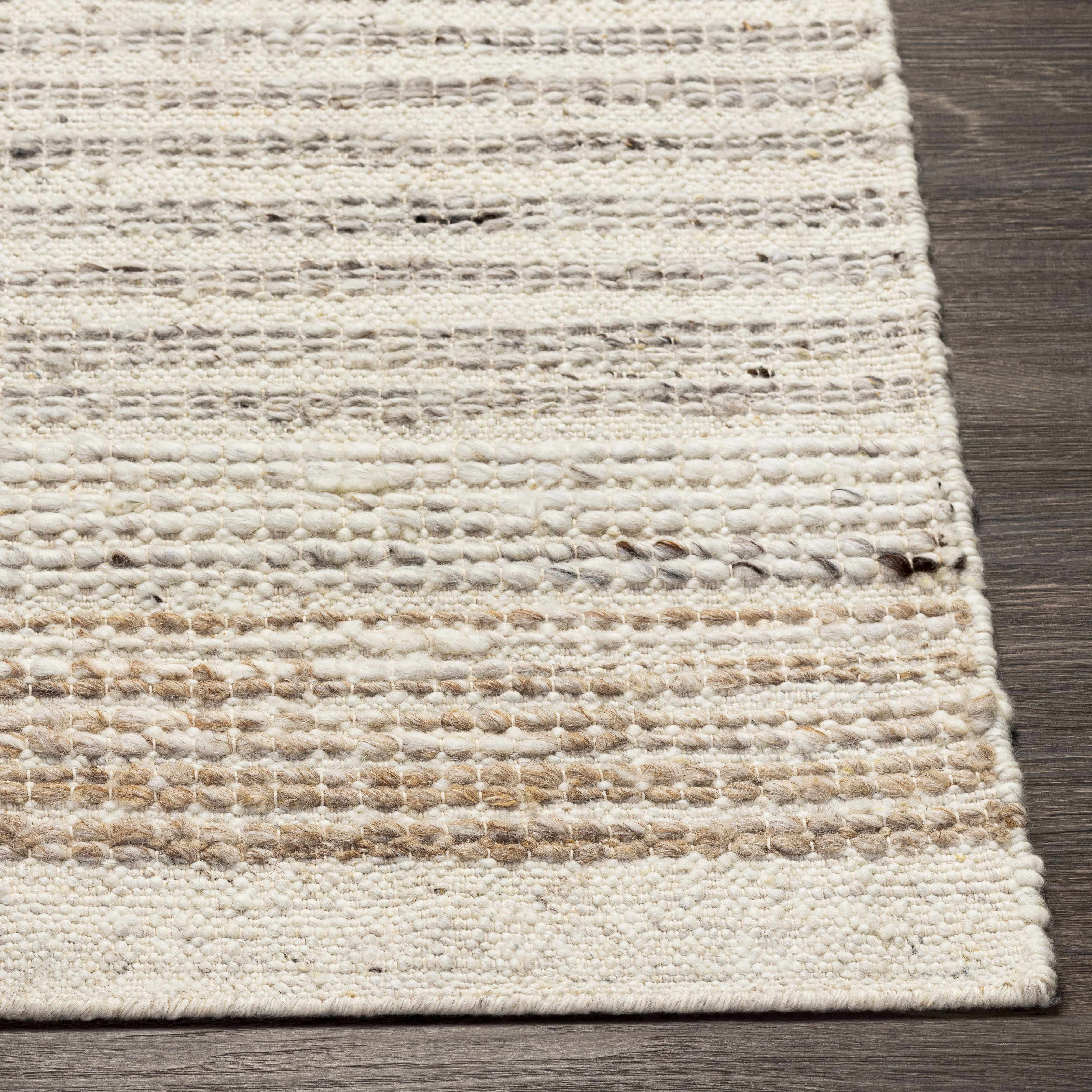 Nifty Cream Hand Woven Wool Area Rug