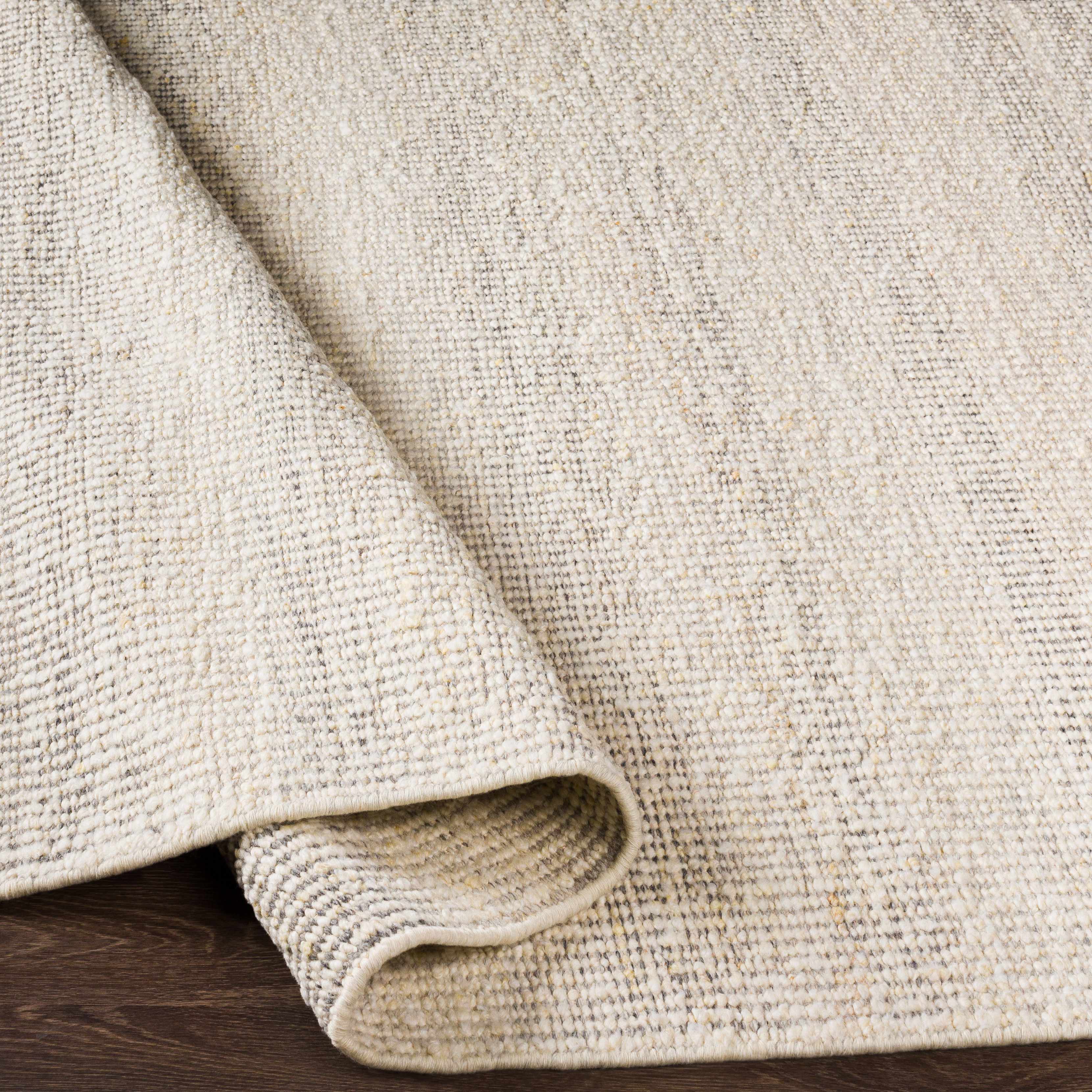 Exotic Chic Cream Hand Woven Wool Area Rug