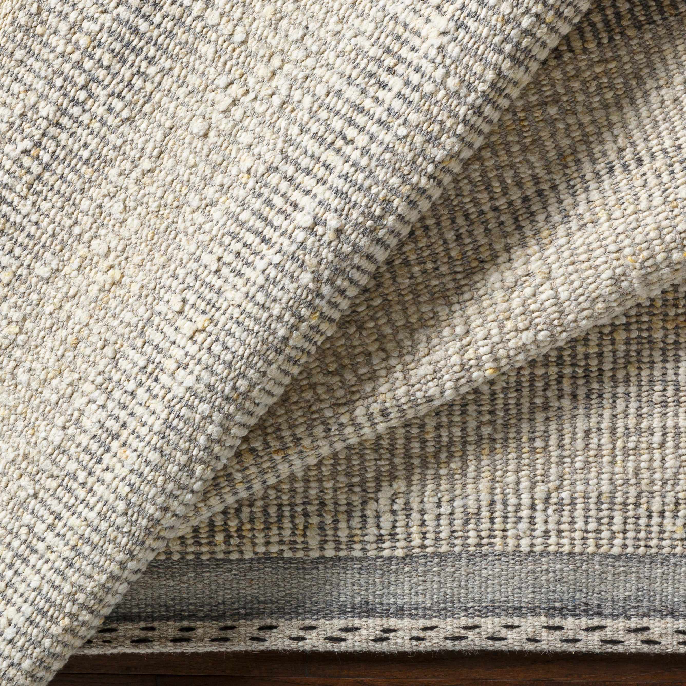 Exotic Chic Cream Hand Woven Wool Area Rug
